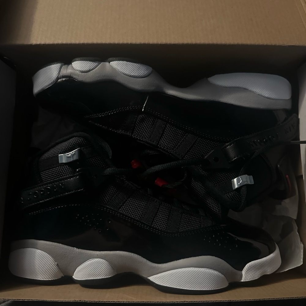 Jordan Kids Black and White High-Top Sneakers